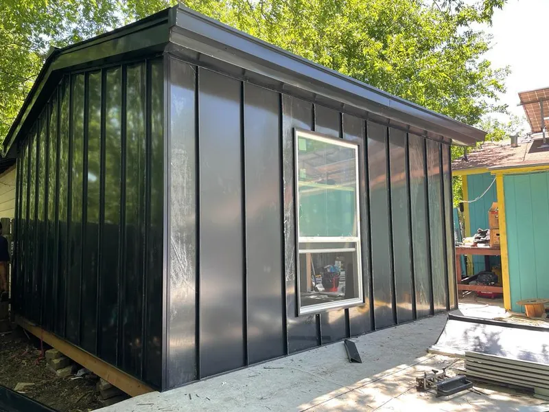 Black standing seam metal wall panels for Metal Roof Installation in Highlands